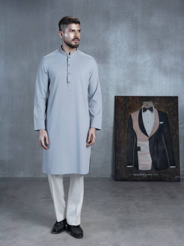 Men's light grey bespoke Panjabi with silver embroidered collar, decorative buttons and dark patterned cuffs