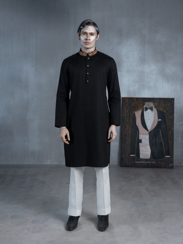 Black bespoke Panjabi with gold embroidered collar, decorative buttons and paisley-patterned cuffs